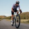 Drive White aero road bike on a mountain road